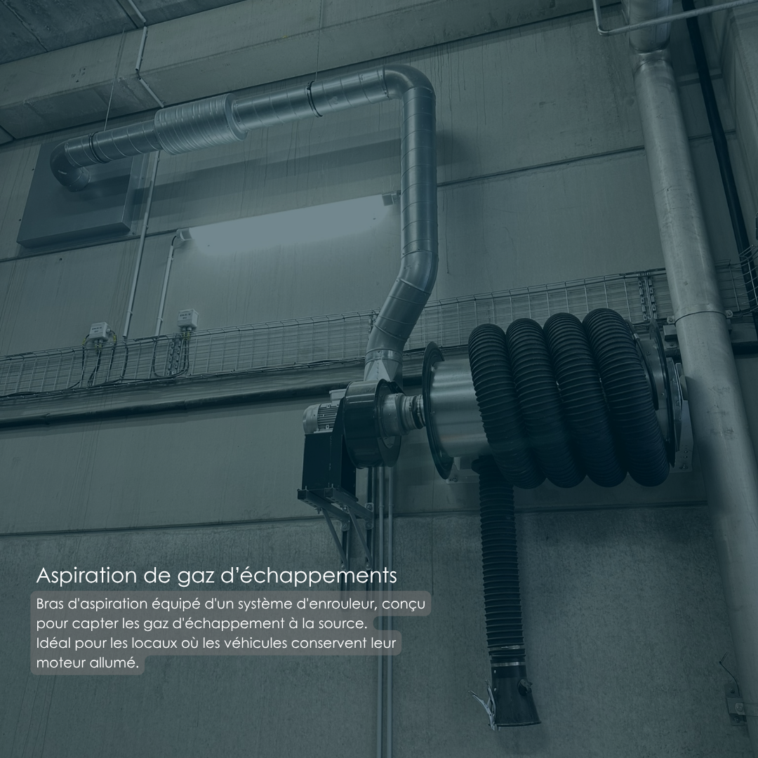 Bras d'aspiration équipé d'un enrouleur pour capter les gaz d'échappement dans un local technique